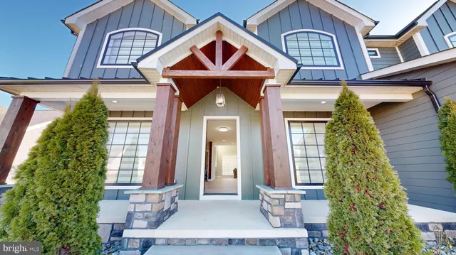 a view of a living room and dining room