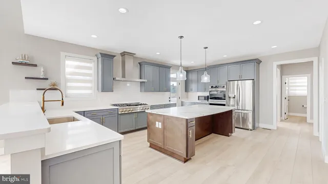 a bathroom with a sink mirror and a bathtub