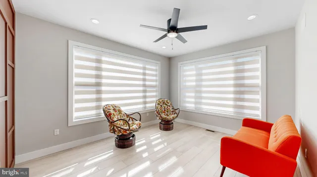 a view of an empty room and bathroom