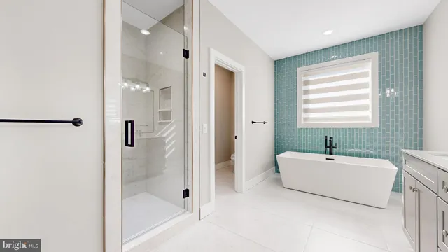 an aerial view of a house with swimming pool