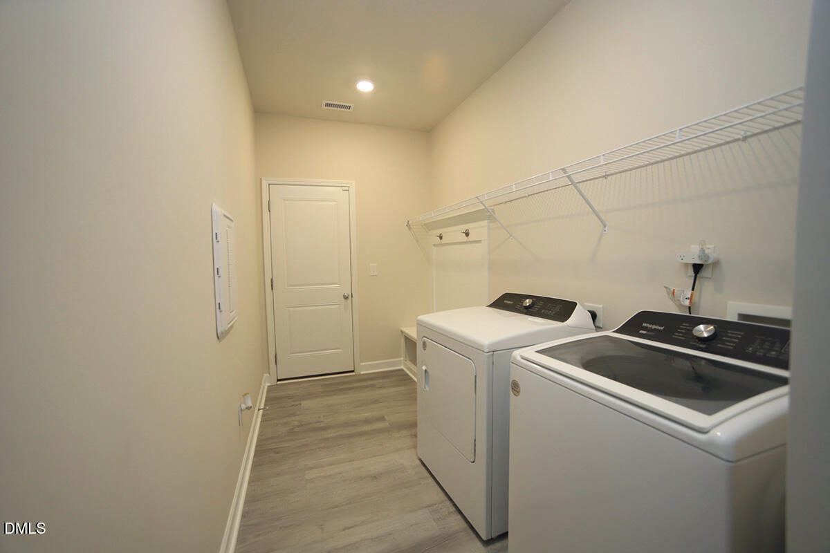 125 Mae Court Roxboro, NC 27573 - Photo 25 of 30 a utility room with dryer and washer