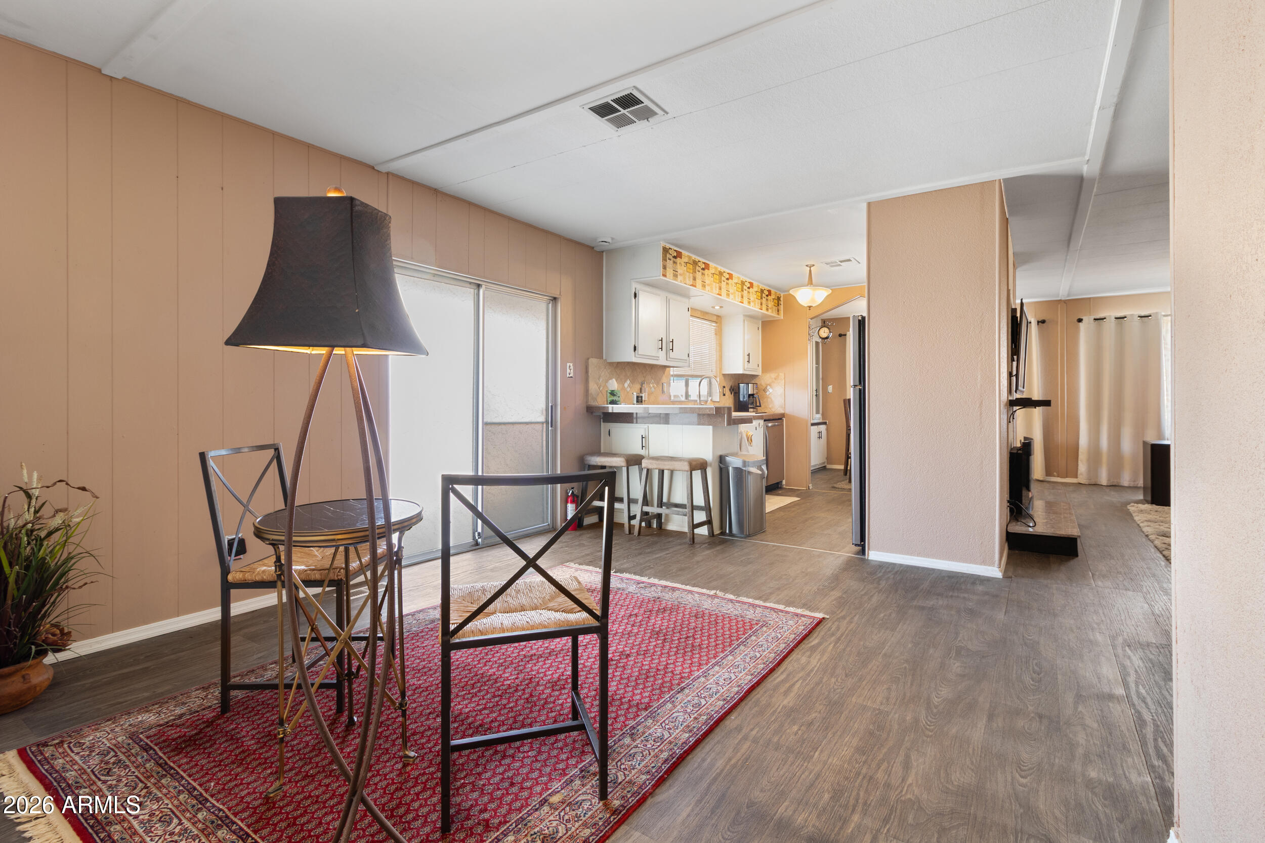 535 South Alma School Road, Unit 99 Mesa, AZ 85210 - Photo 13 of 77 a view of a livingroom with furniture and a window