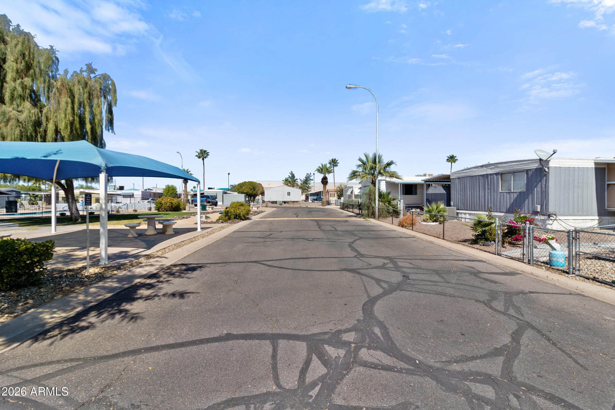 535 South Alma School Road, Unit 99 Mesa, AZ 85210 - Photo 38 of 77 a view of a street with cars
