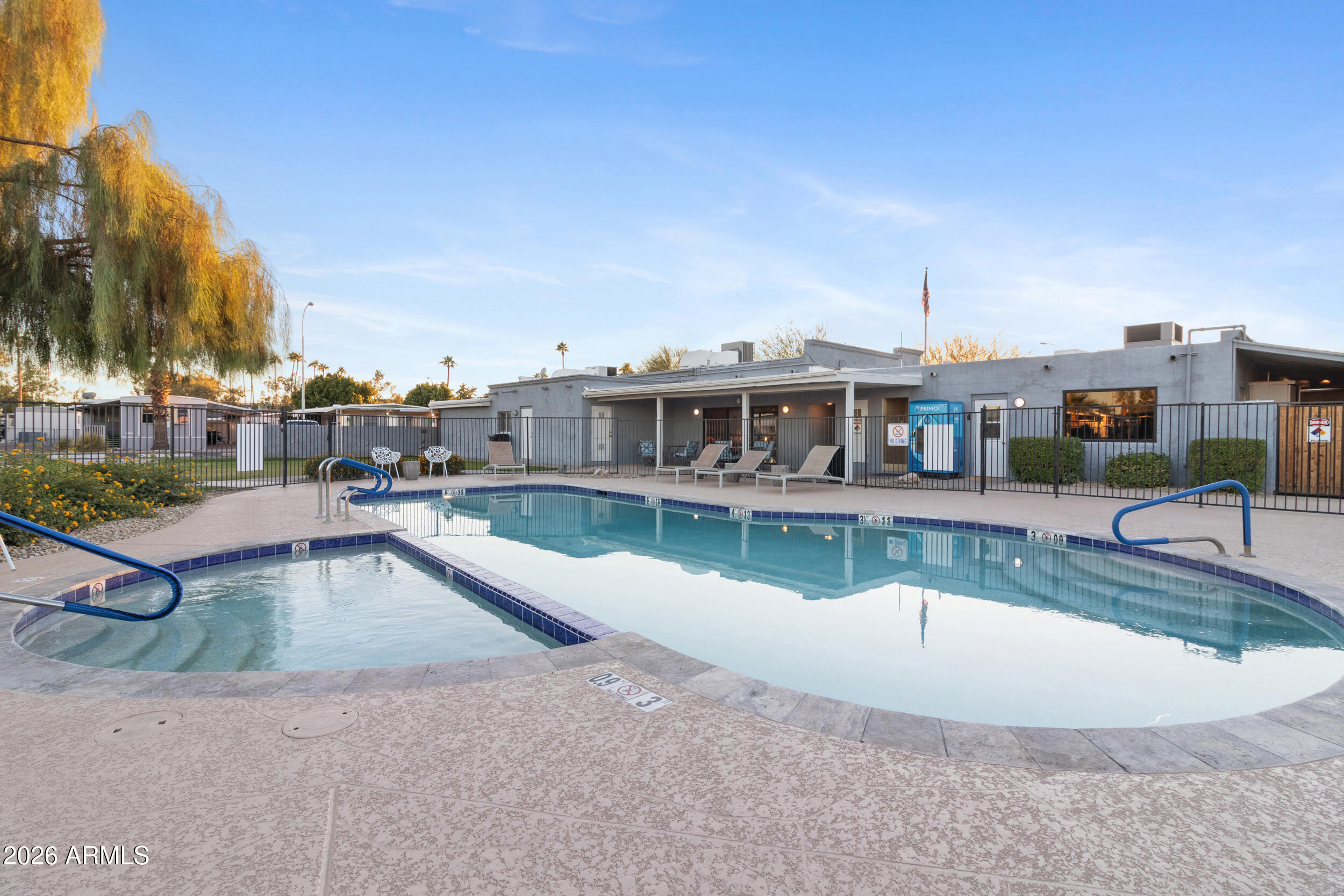 535 South Alma School Road, Unit 99 Mesa, AZ 85210 - Photo 63 of 77 a view of a swimming pool with a patio