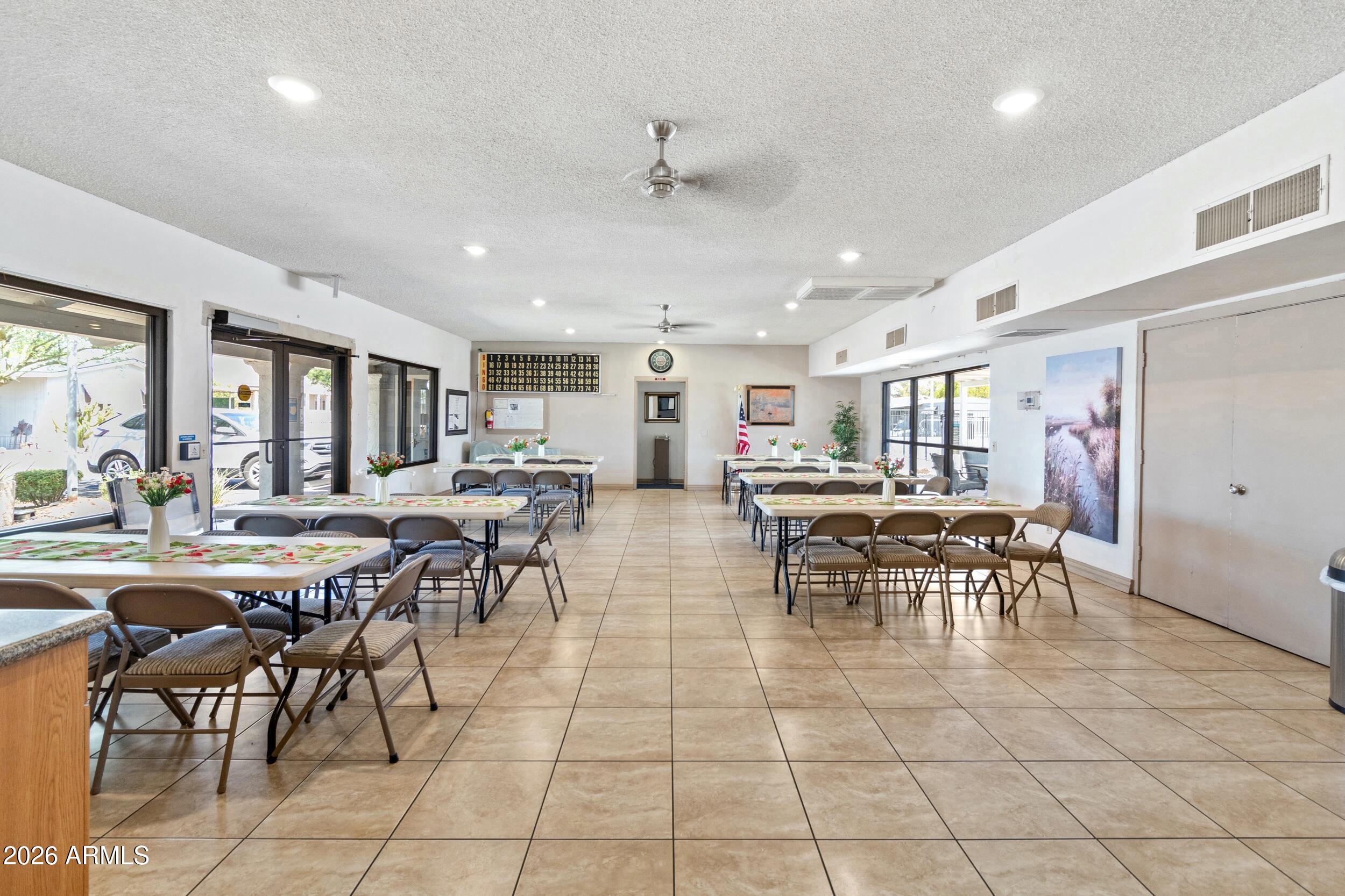 535 South Alma School Road, Unit 99 Mesa, AZ 85210 - Photo 64 of 77 a view of a dining area with furniture