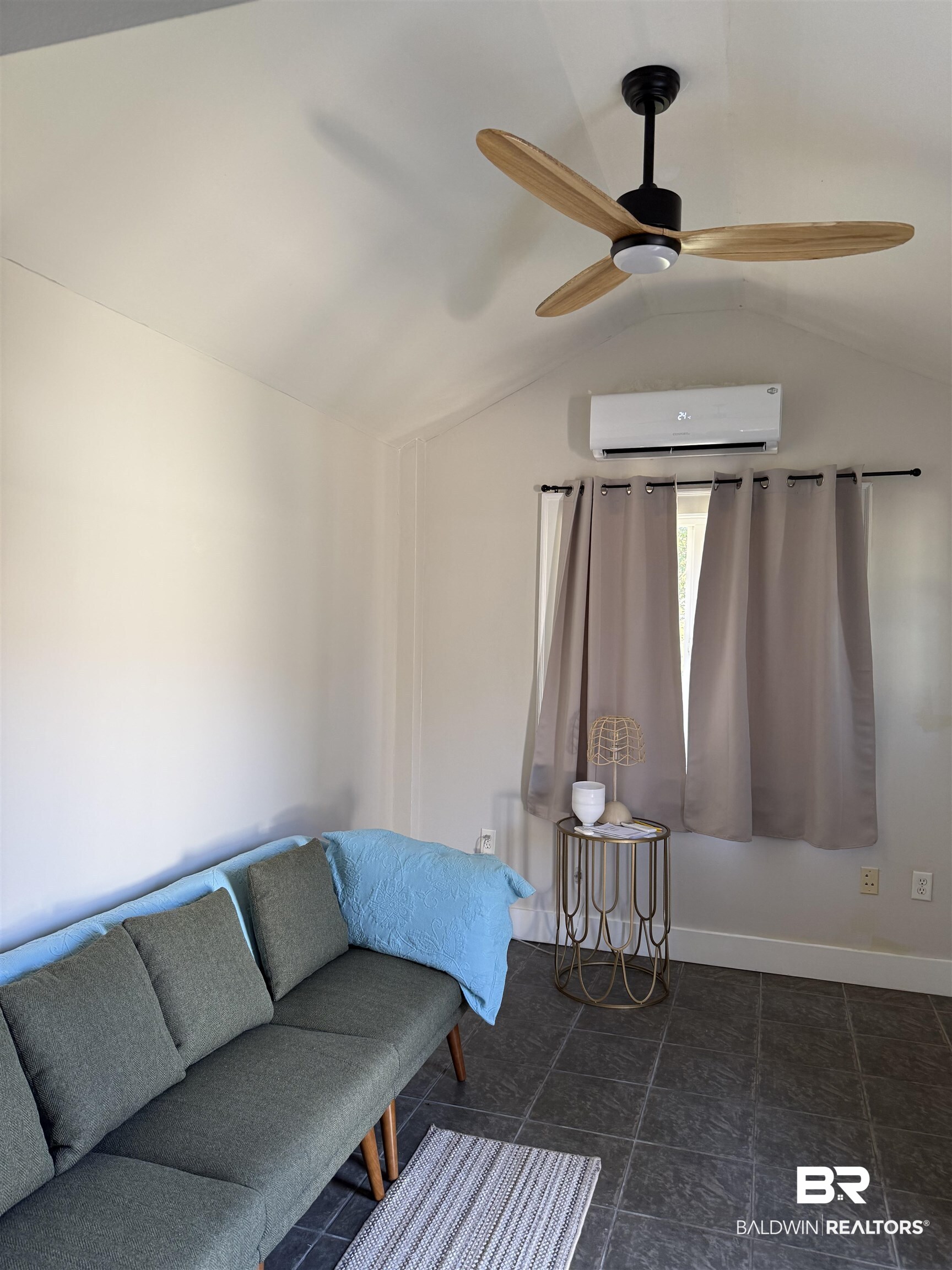 28114 Preserve Trail, Unit 190 Elberta, AL 36530 - Photo 23 of 69 Living area with vaulted ceiling, ceiling fan, and a wall mounted mini split