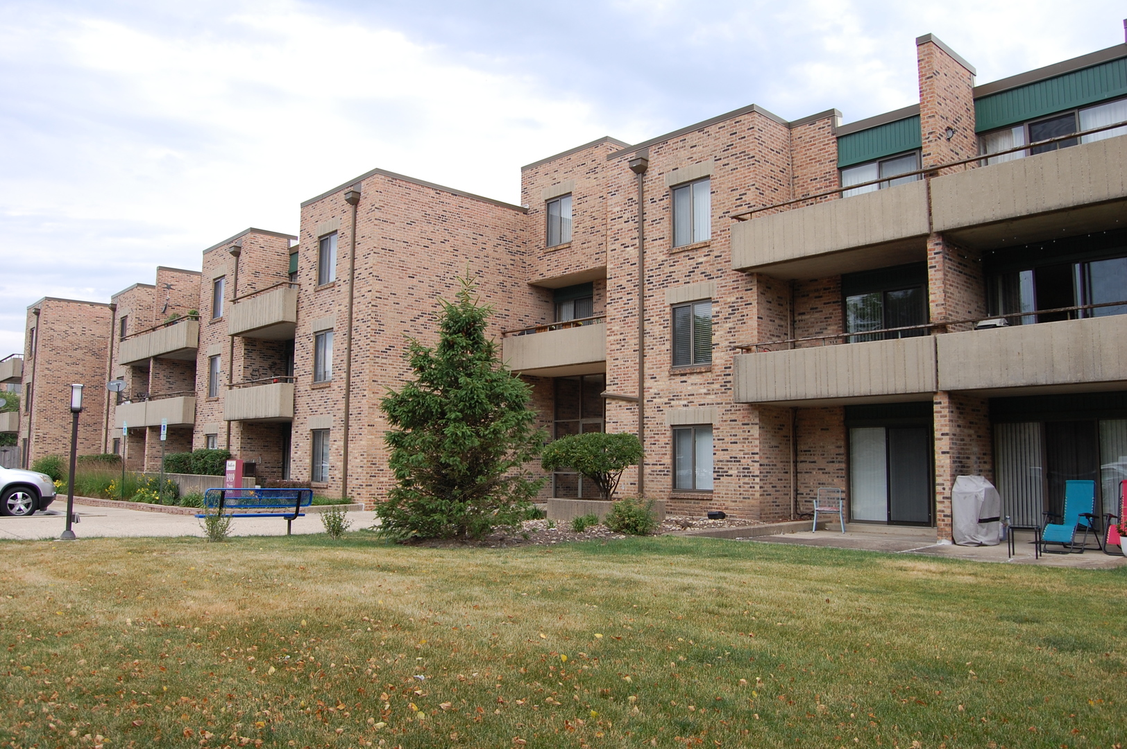 1919 Prairie Square, Unit 102 Schaumburg, IL 60173 - Photo 1 of 25 a view of a big building with many windows