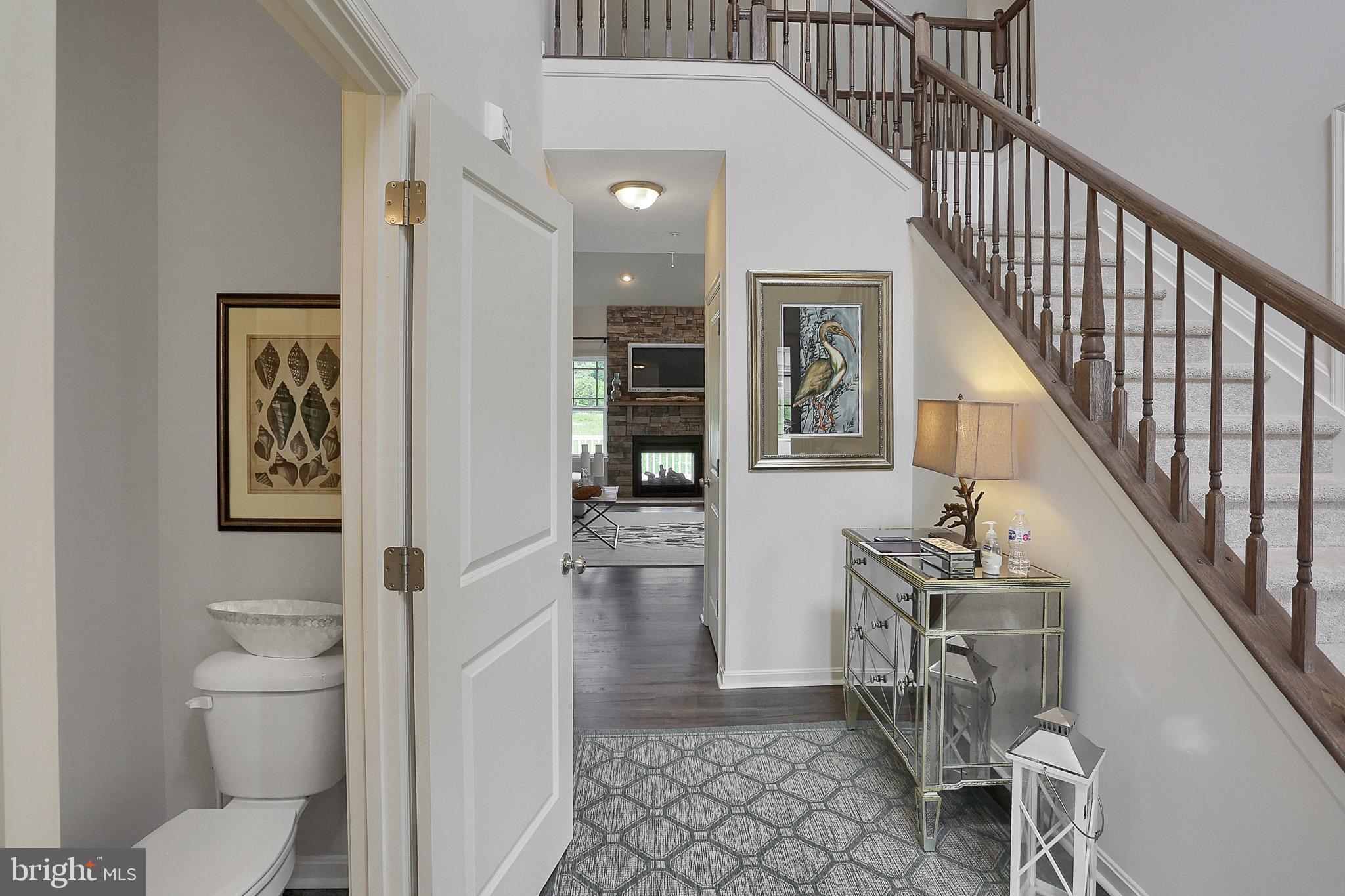 Tbd Tbd Tbd Pine Conowingo, MD 21918 - Photo 12 of 24 a bathroom with a toilet a sink and mirror