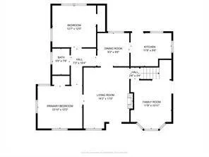 a picture of a bench in front of a gate