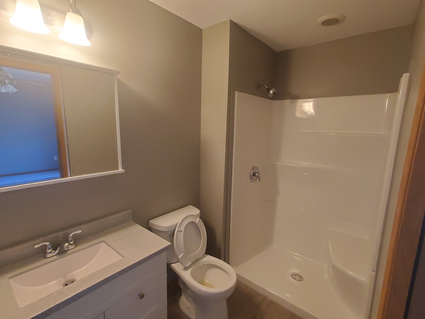 38188 North 3rd Avenue Spring Grove, IL 60081 - Photo 12 of 14 a bathroom with a sink toilet and shower