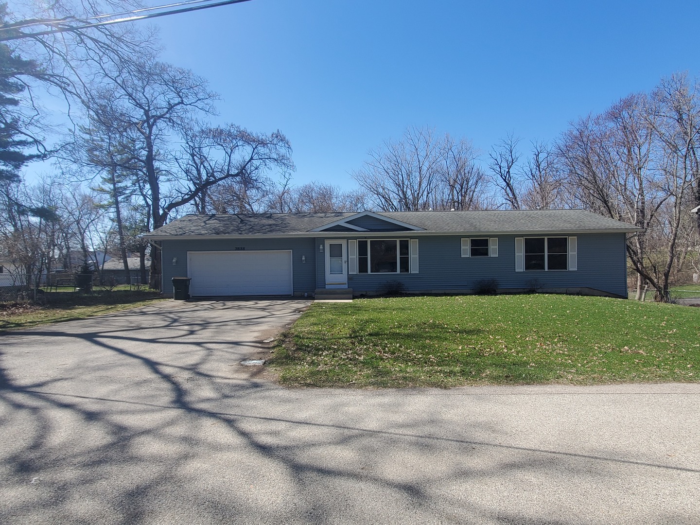 38188 North 3rd Avenue Spring Grove, IL 60081 - Photo 2 of 14 a front view of a house with a garden