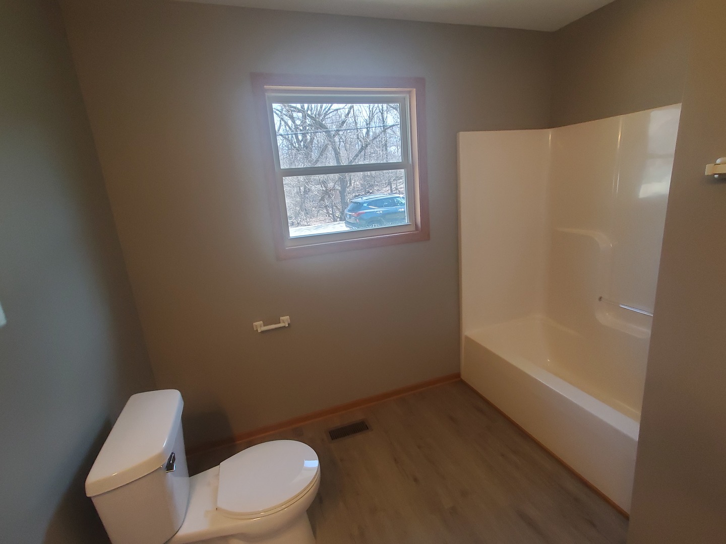 38188 North 3rd Avenue Spring Grove, IL 60081 - Photo 10 of 14 a white toilet sitting next to a bath tub
