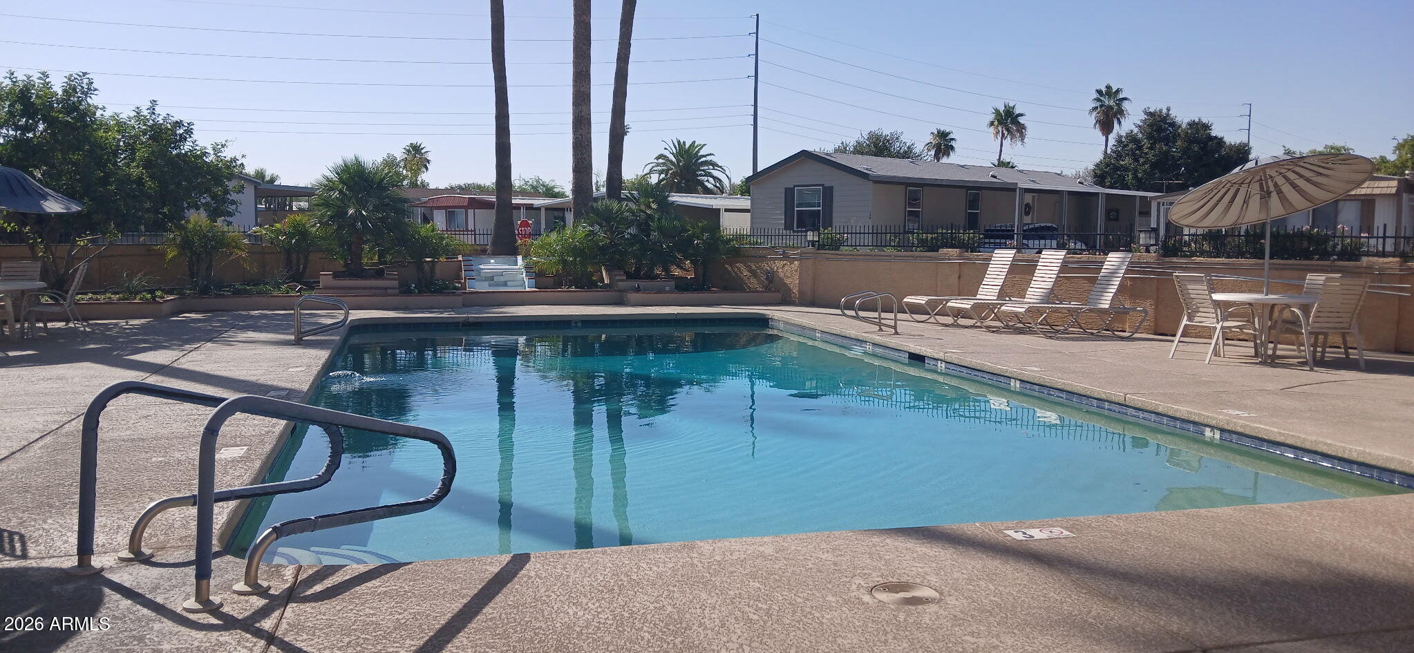 200 East Knox Road, Unit 91 Chandler, AZ 85225 - Photo 35 of 37 a view of swimming pool from a balcony