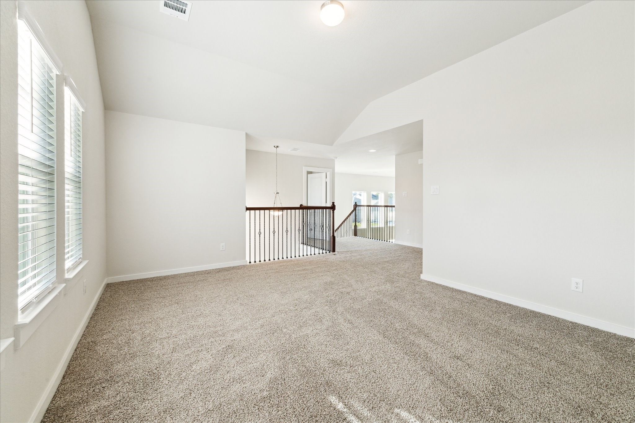 7838 Ruth Ravine Court Spring, TX 77379 - Photo 14 of 20 a view of empty room with wooden floor and window