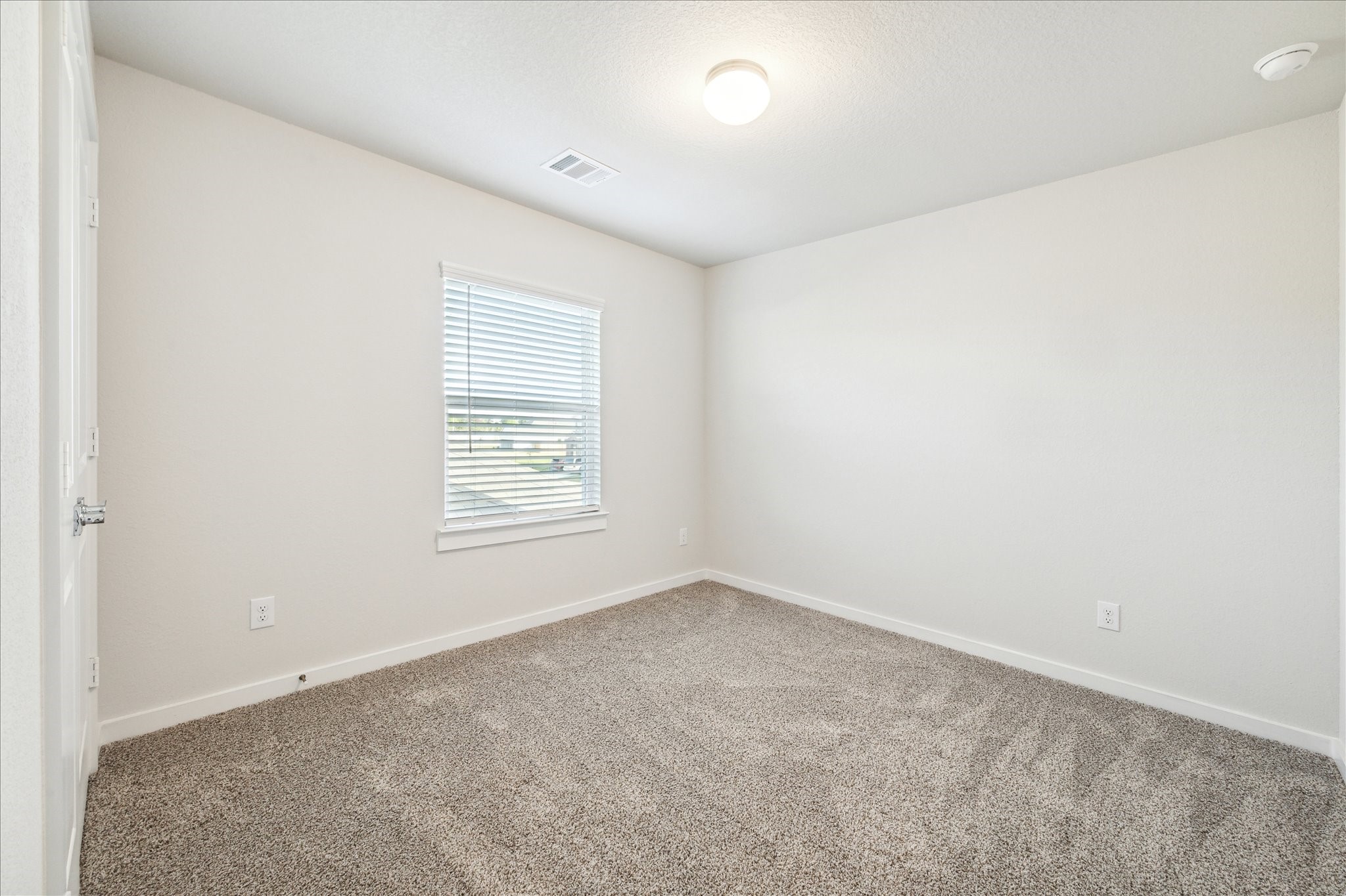 7838 Ruth Ravine Court Spring, TX 77379 - Photo 16 of 20 an empty room with a window
