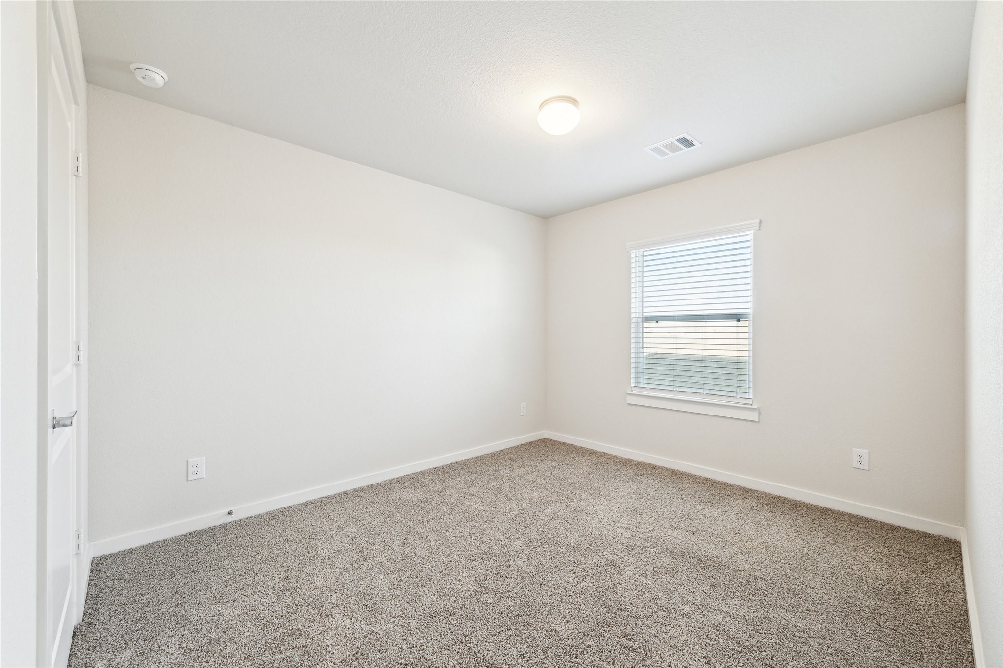 7838 Ruth Ravine Court Spring, TX 77379 - Photo 17 of 20 an empty room with a window