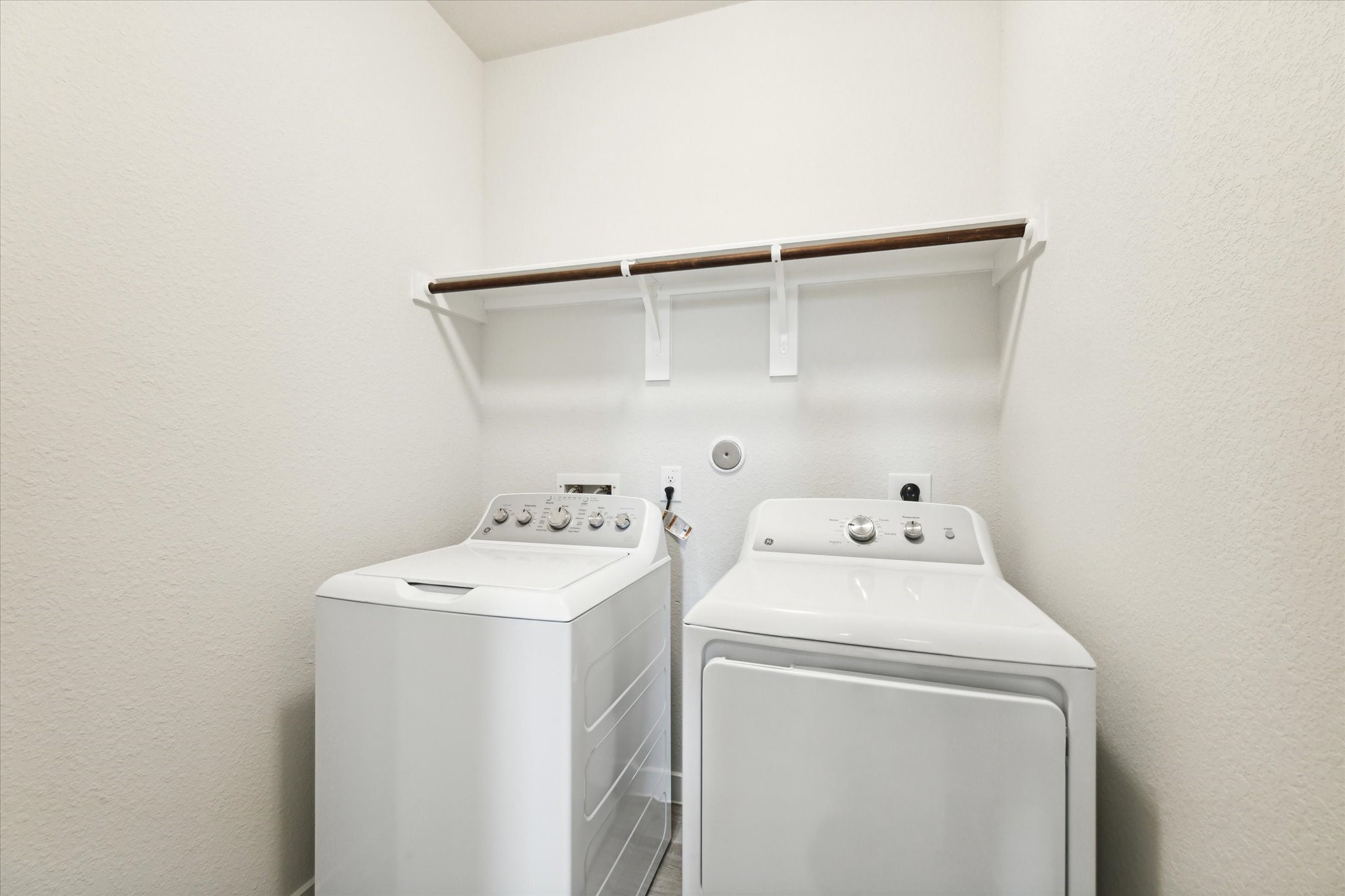 7838 Ruth Ravine Court Spring, TX 77379 - Photo 19 of 20 a utility room with dryer and washer