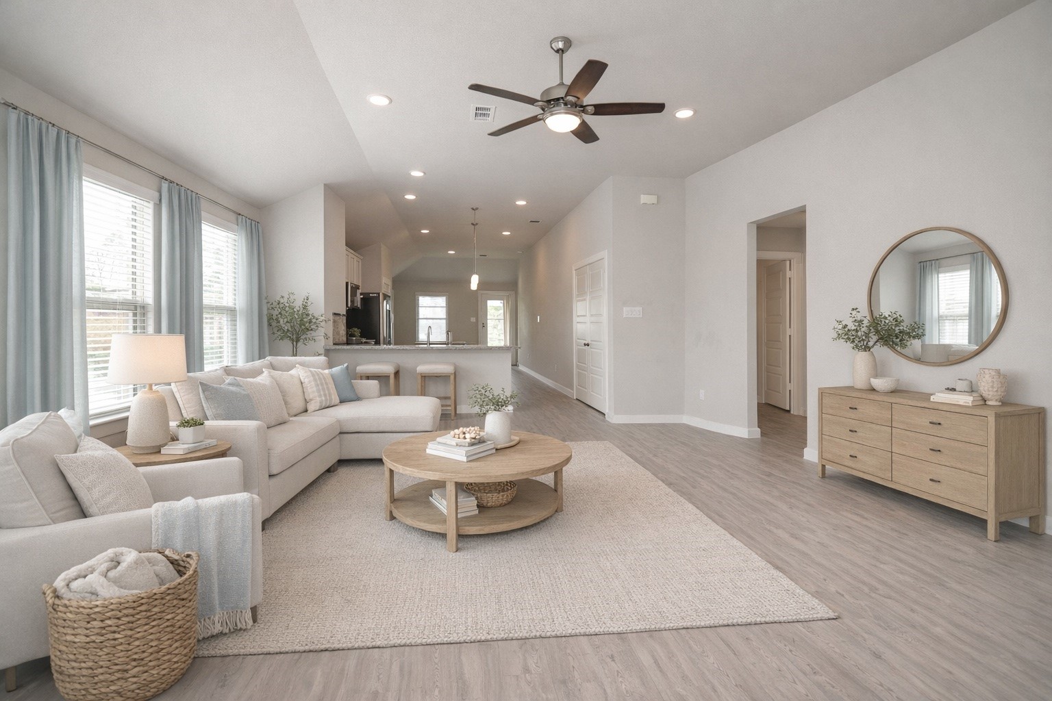 8230 Blue Fish Drive Cypress, TX 77433 - Photo 5 of 18 Living room has an open layout that flows into the kitchen and dining area. There are tons of windows that let in natural light and modern recessed lighting.
*Virtually Staged*