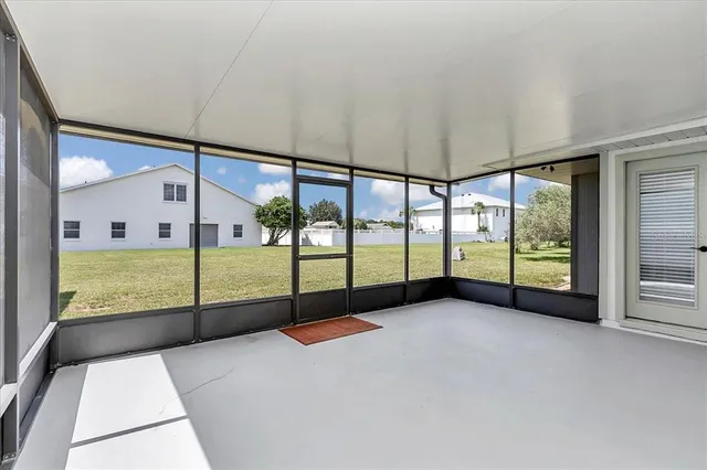 a view of an empty room with window