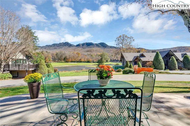 a view of an chairs and tables in the patio