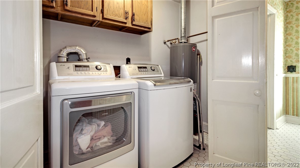 6250 Smithfield Road Wade, NC 28395 - Photo 18 of 46 a utility room with dryer and washer
