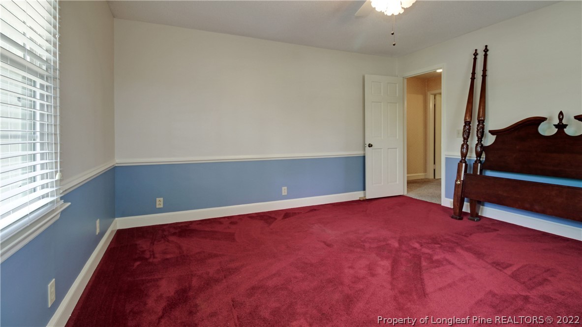 6250 Smithfield Road Wade, NC 28395 - Photo 30 of 46 a view of room with window and a ceiling fan