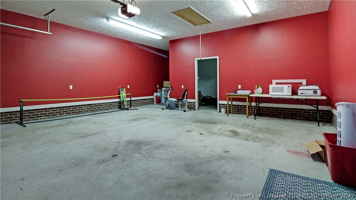 6250 Smithfield Road Wade, NC 28395 - Photo 38 of 46 a view of a room with gym equipment