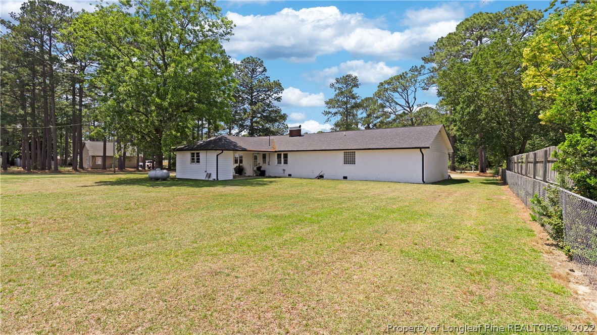 6250 Smithfield Road Wade, NC 28395 - Photo 43 of 46 a house view with swimming pool in front of it