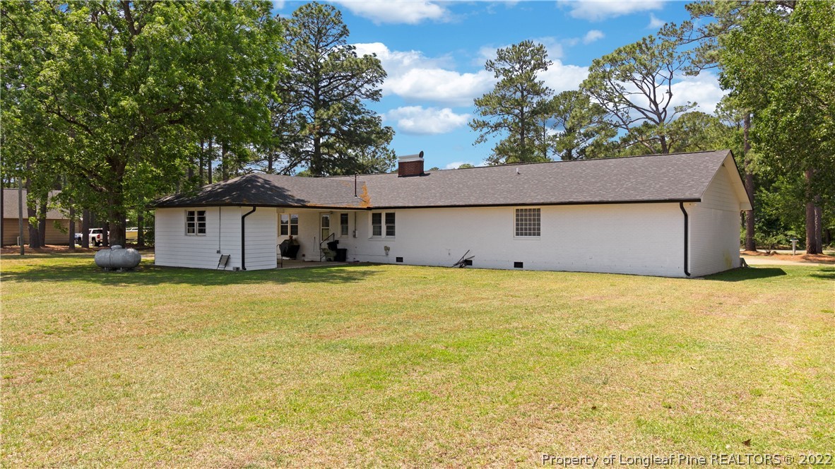 6250 Smithfield Road Wade, NC 28395 - Photo 44 of 46 a house view with a garden space