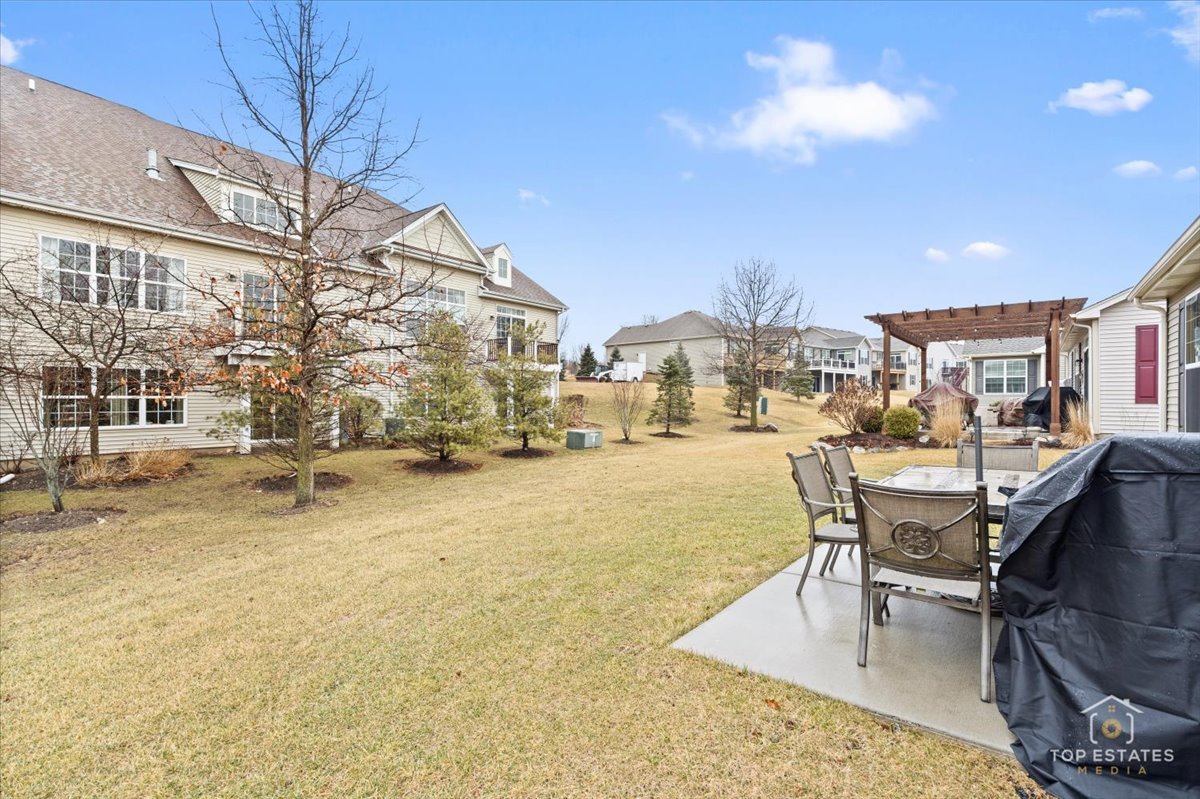 2010 Azure Lane Algonquin, IL 60102 - Photo 30 of 41 a view of a swimming pool with outdoor seating