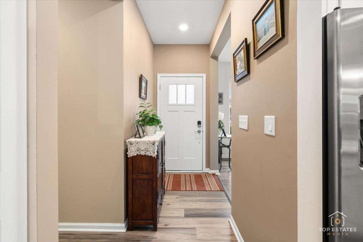 2010 Azure Lane Algonquin, IL 60102 - Photo 6 of 41 a view of entryway with wooden floor