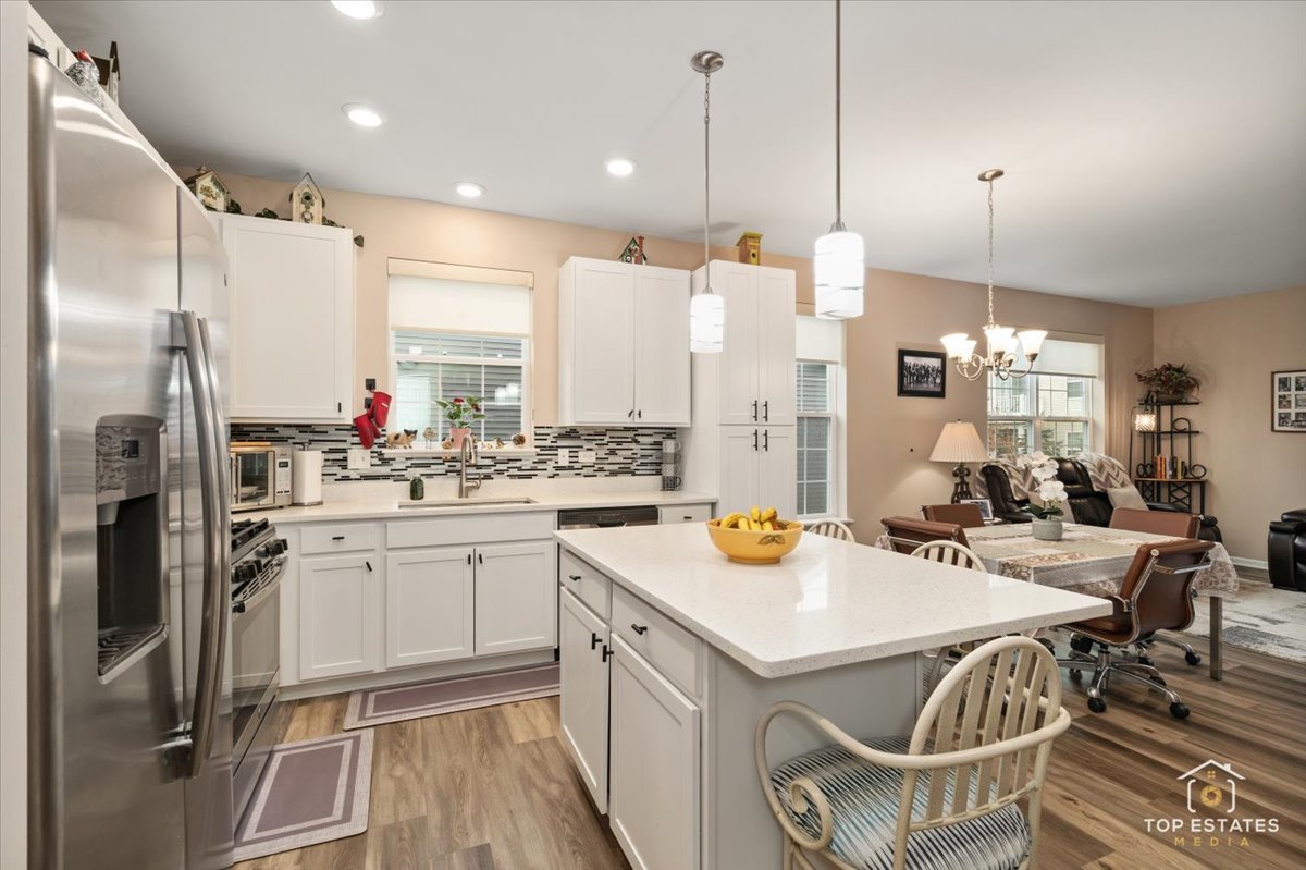 2010 Azure Lane Algonquin, IL 60102 - Photo 10 of 41 a kitchen with a sink appliances and cabinets