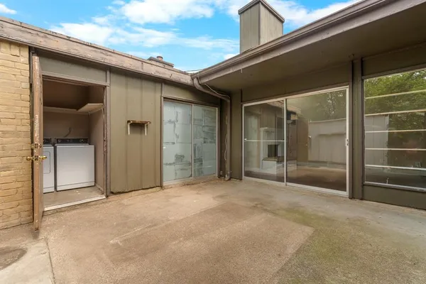 a view of an empty room with a garage