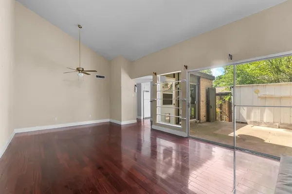 a view of a livingroom with wooden floor