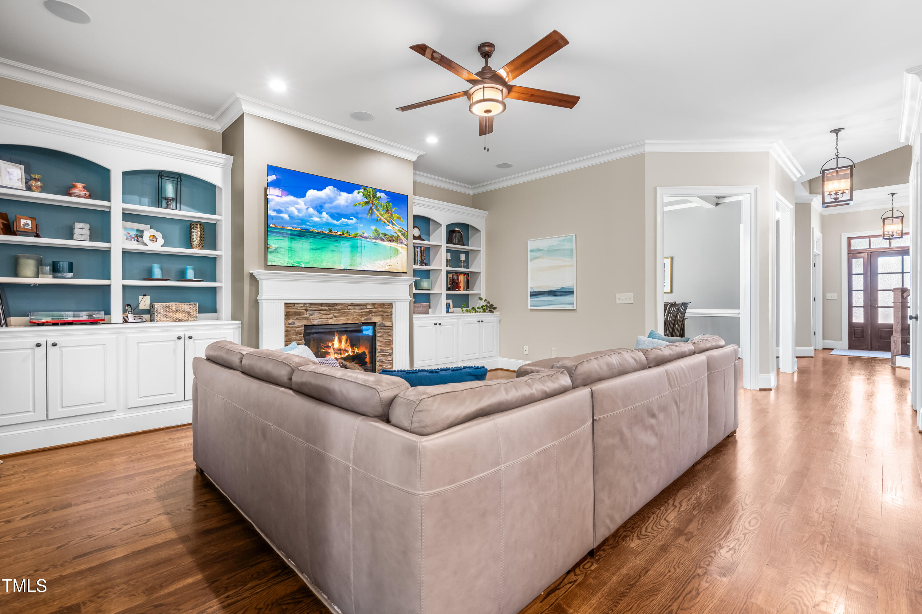 2538 Tuffeto Apex, NC 27502 - Photo 18 of 55 a living room with furniture and a fireplace