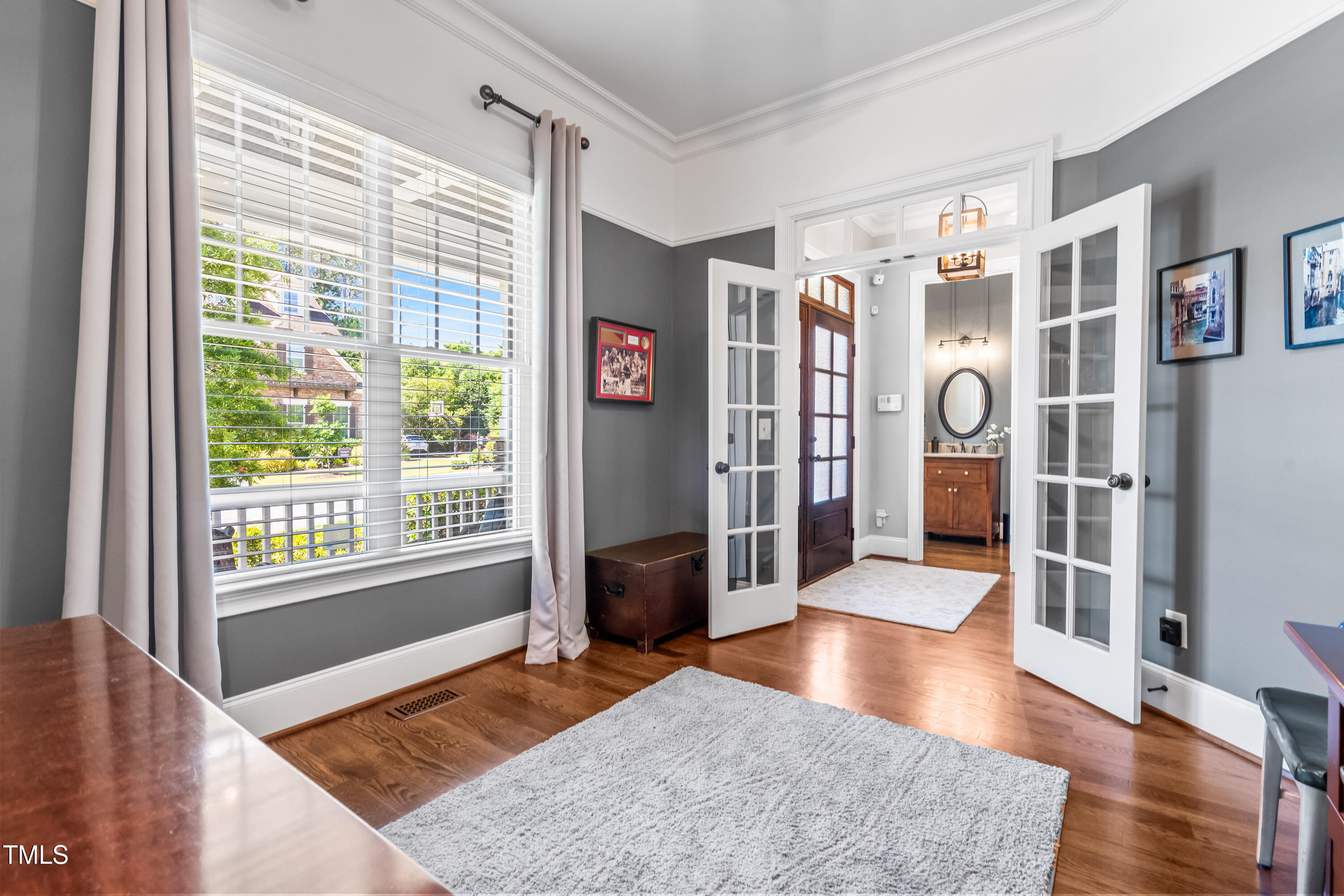 2538 Tuffeto Apex, NC 27502 - Photo 26 of 55 a living room with furniture and a rug