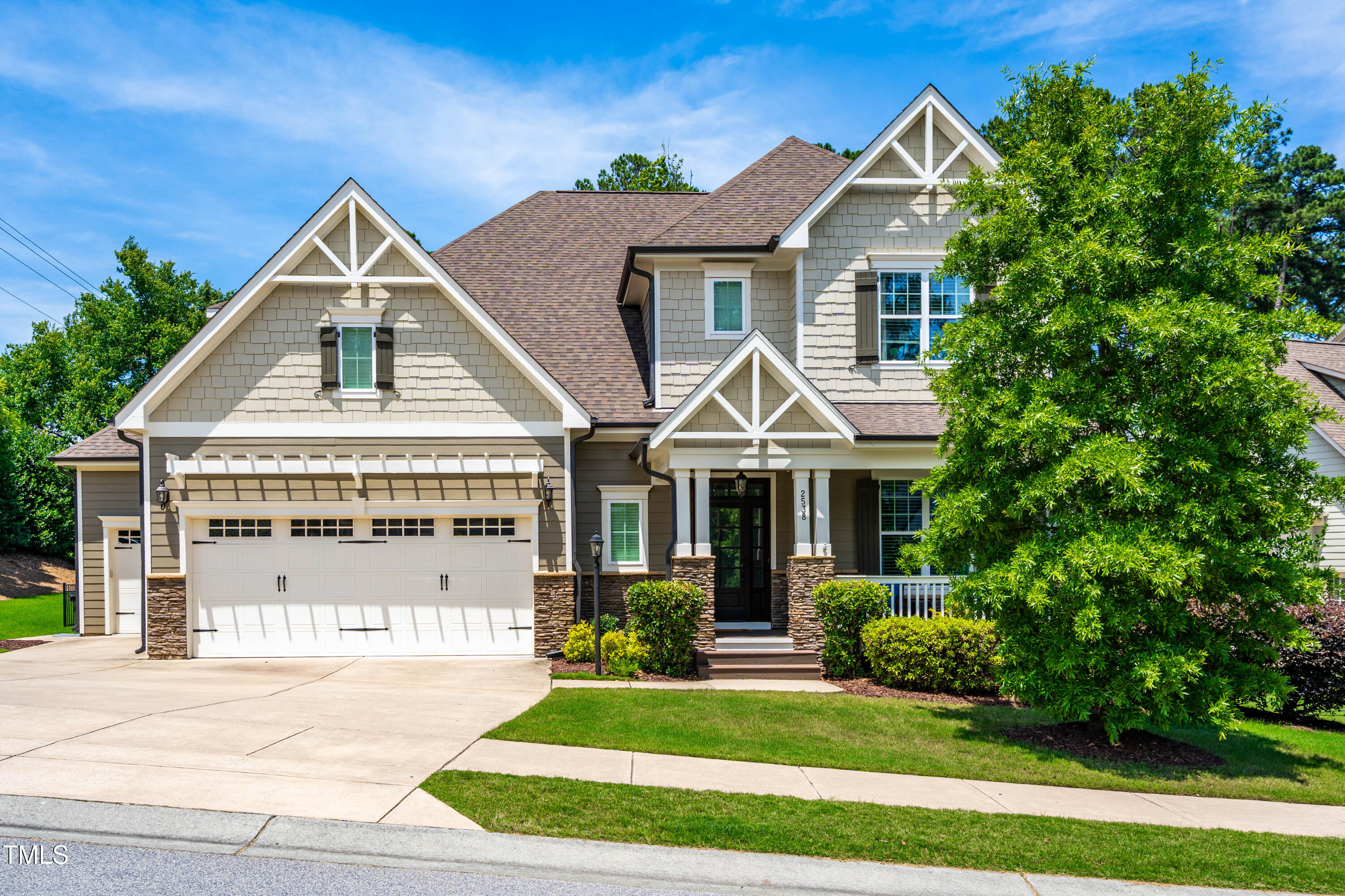 2538 Tuffeto Apex, NC 27502 - Photo 3 of 55 a front view of a house with a yard