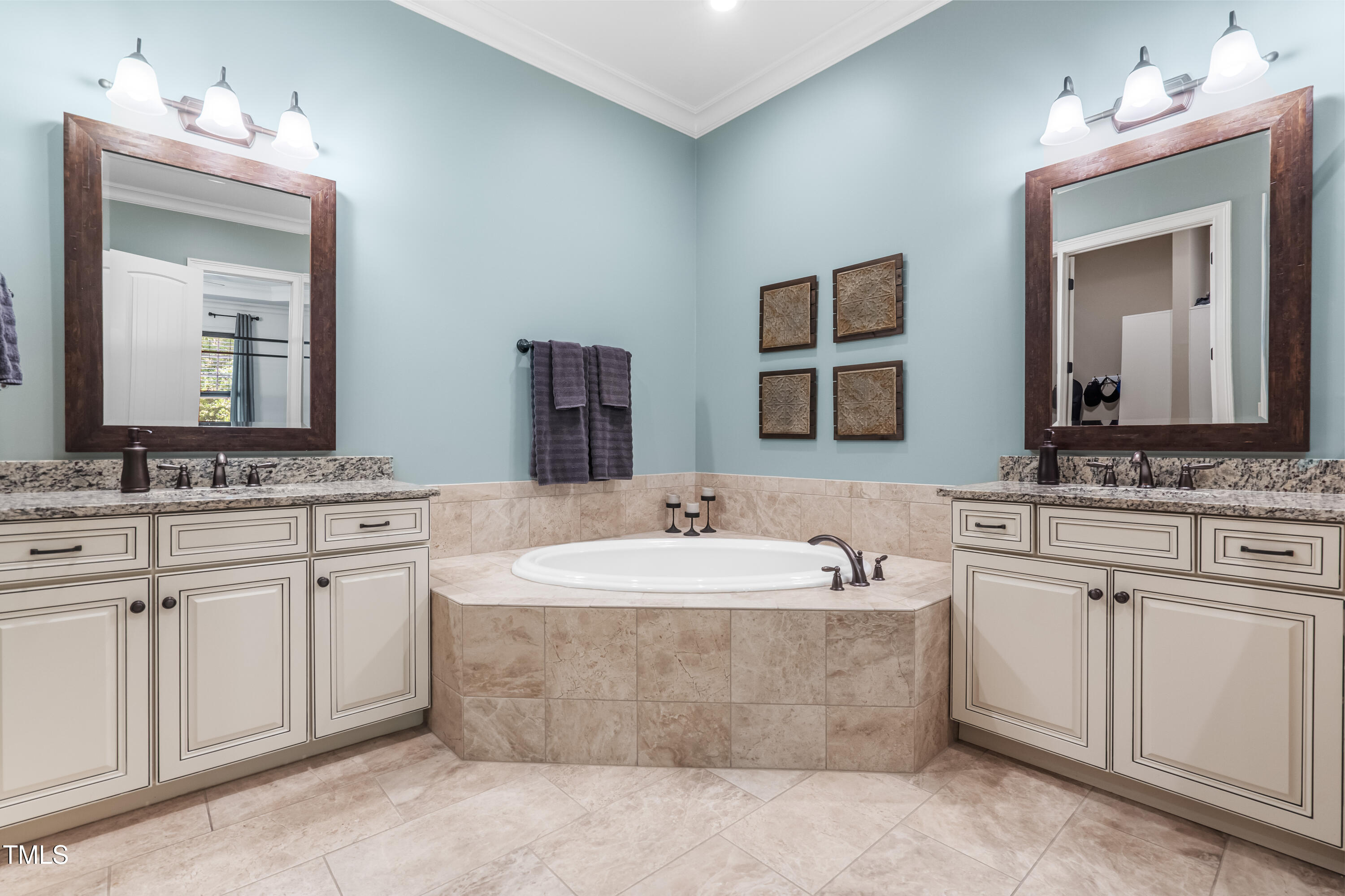 2538 Tuffeto Apex, NC 27502 - Photo 33 of 55 a bathroom with a double vanity sink mirror and bathtub