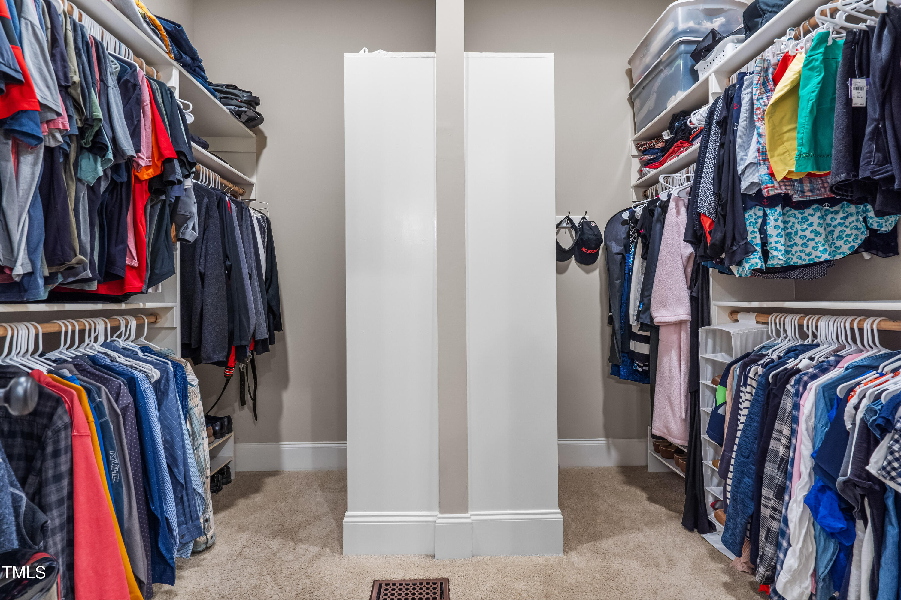 2538 Tuffeto Apex, NC 27502 - Photo 35 of 55 a view of walk in closet with clothes and shoes