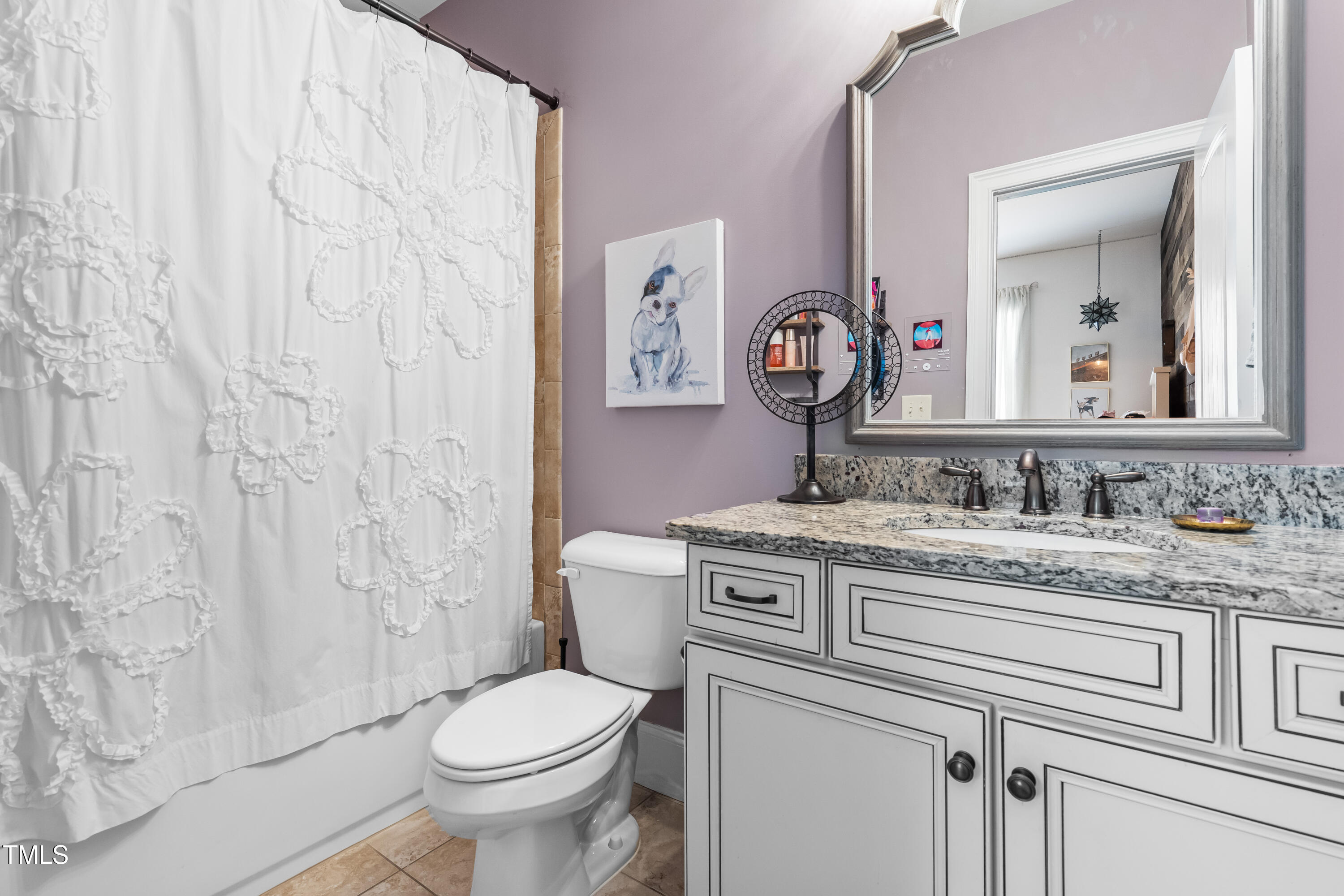 2538 Tuffeto Apex, NC 27502 - Photo 40 of 55 a bathroom with a granite countertop toilet sink and mirror