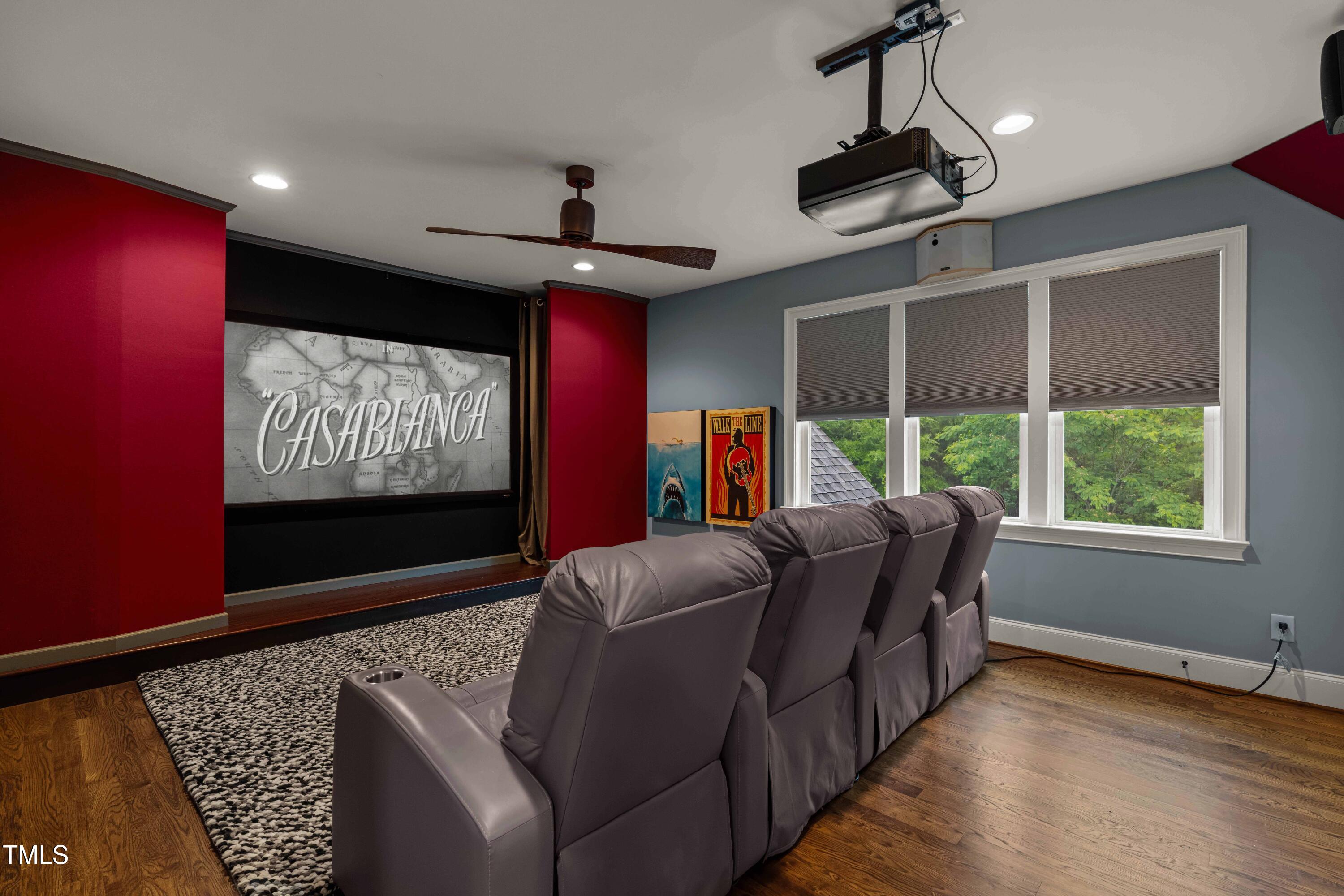 2538 Tuffeto Apex, NC 27502 - Photo 44 of 55 a living room with furniture and a flat screen tv