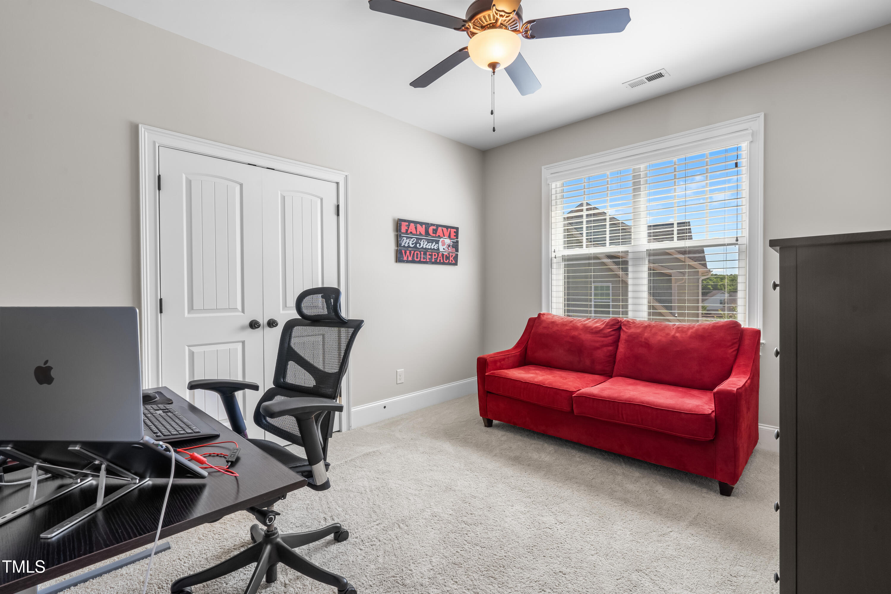 2538 Tuffeto Apex, NC 27502 - Photo 46 of 55 a view of a livingroom with workspace and a window