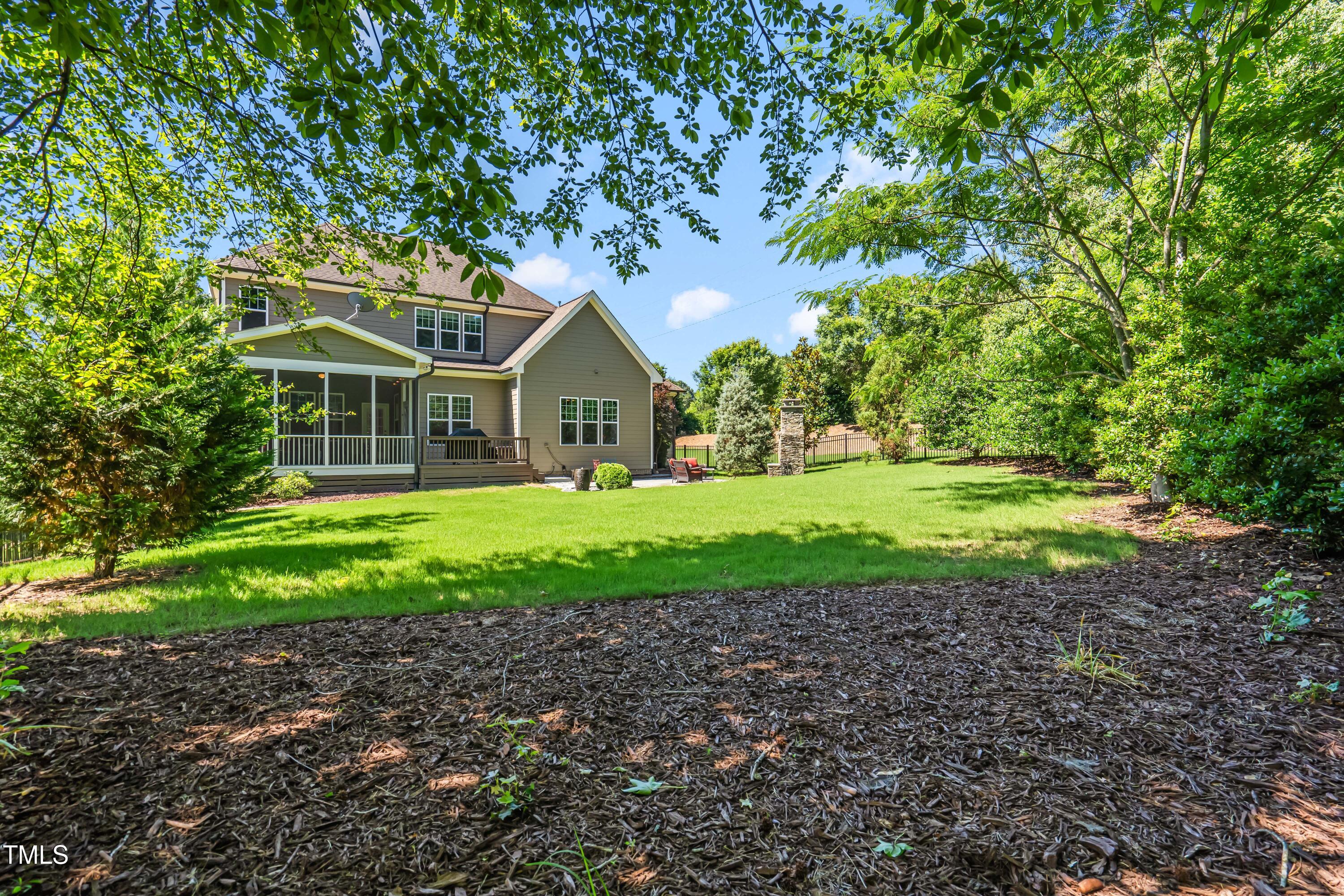 2538 Tuffeto Apex, NC 27502 - Photo 53 of 55 a front view of a house with a yard