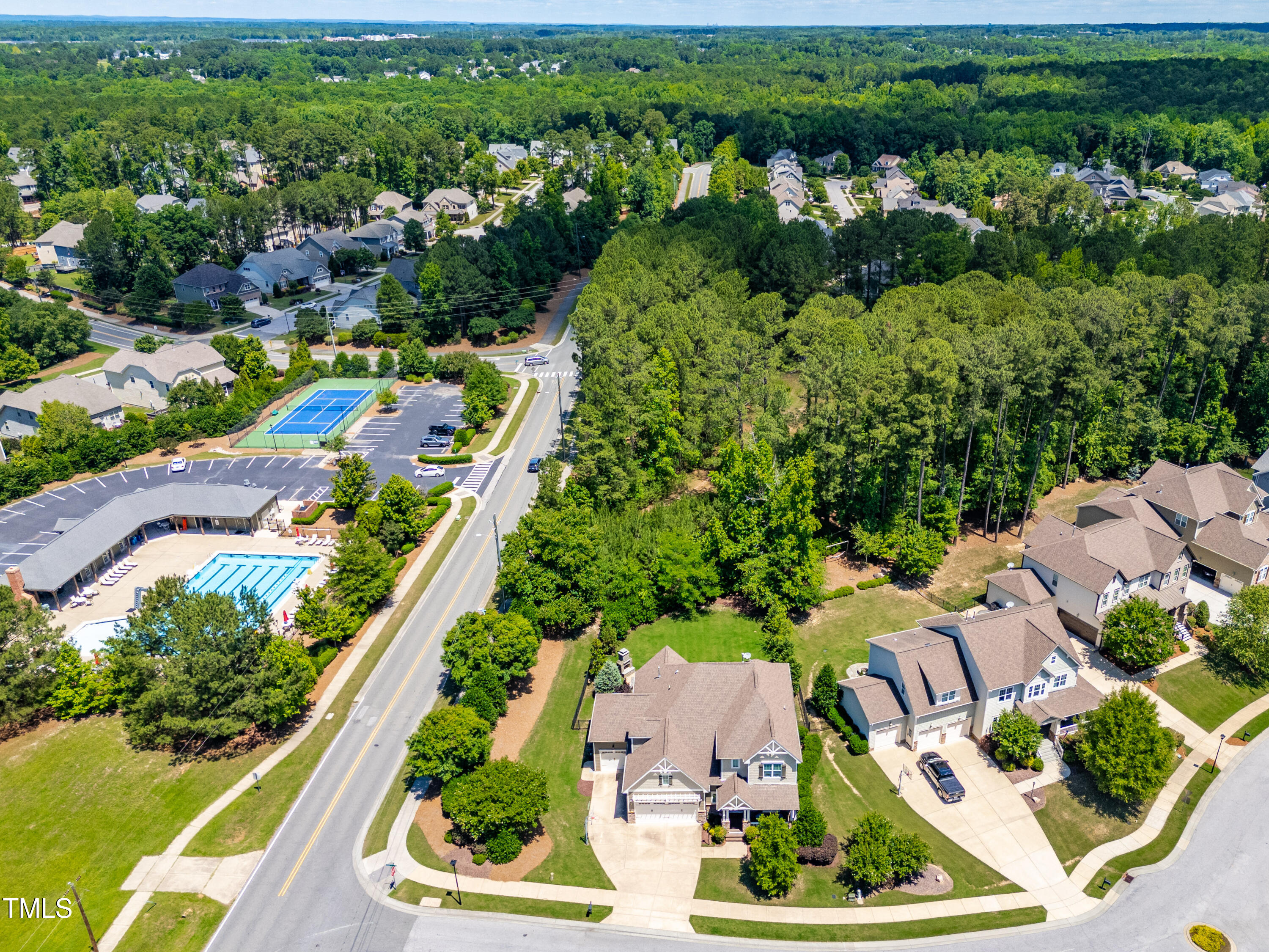 2538 Tuffeto Apex, NC 27502 - Photo 55 of 55 an aerial view of residential houses with outdoor space and street view