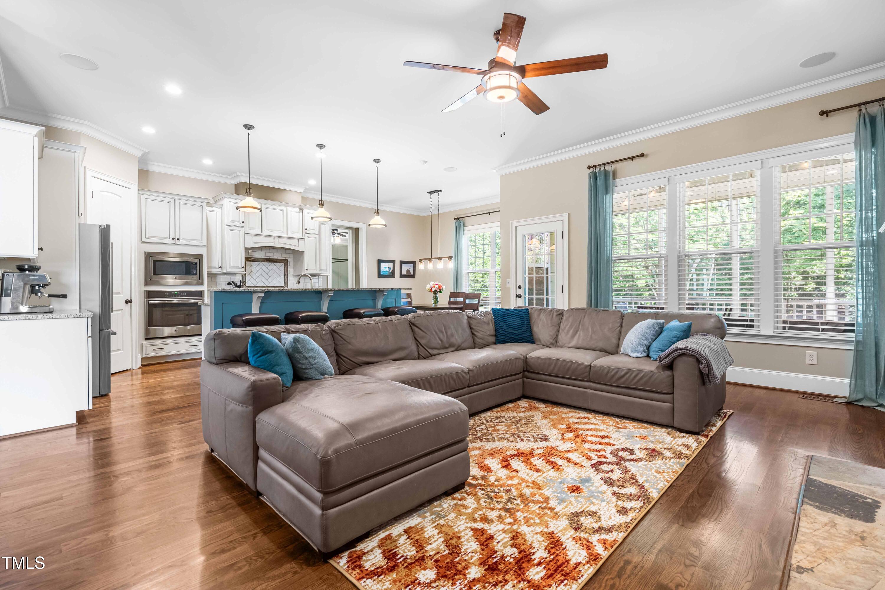 2538 Tuffeto Apex, NC 27502 - Photo 10 of 55 a living room with furniture kitchen view and a large window
