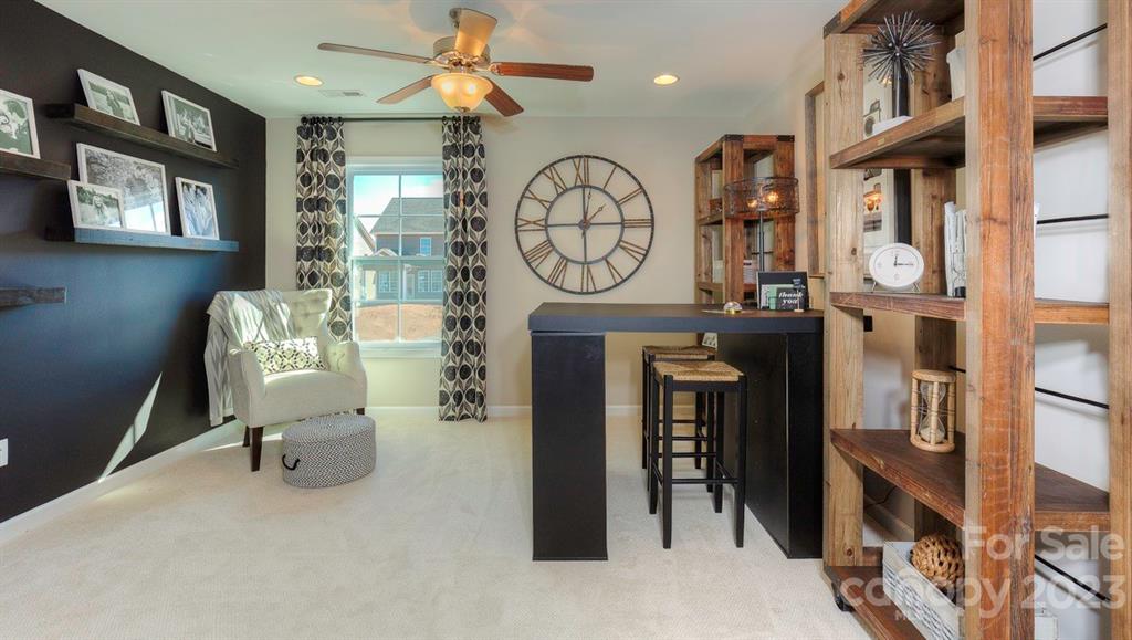 679 Fox Cove Road Hendersonville, NC 28792 - Photo 17 of 35 a living room with fireplace furniture and a window