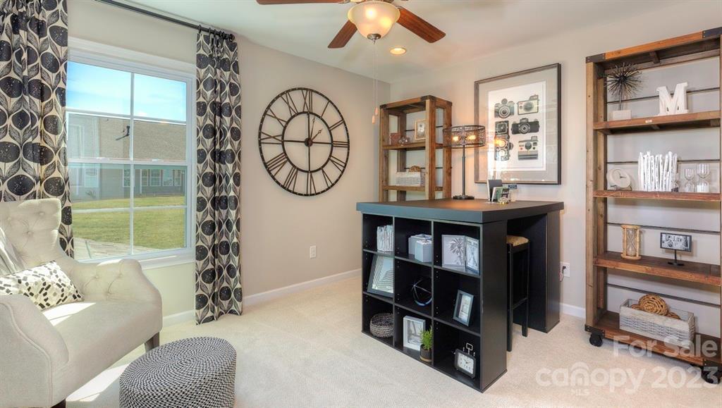 679 Fox Cove Road Hendersonville, NC 28792 - Photo 18 of 35 a living room with furniture and a window