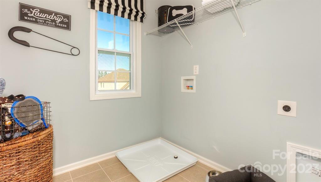 679 Fox Cove Road Hendersonville, NC 28792 - Photo 29 of 35 a bathroom with a sink and a mirror