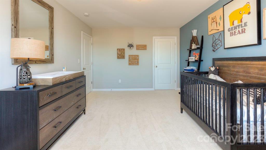 679 Fox Cove Road Hendersonville, NC 28792 - Photo 32 of 35 a view of a hallway to a room with stair