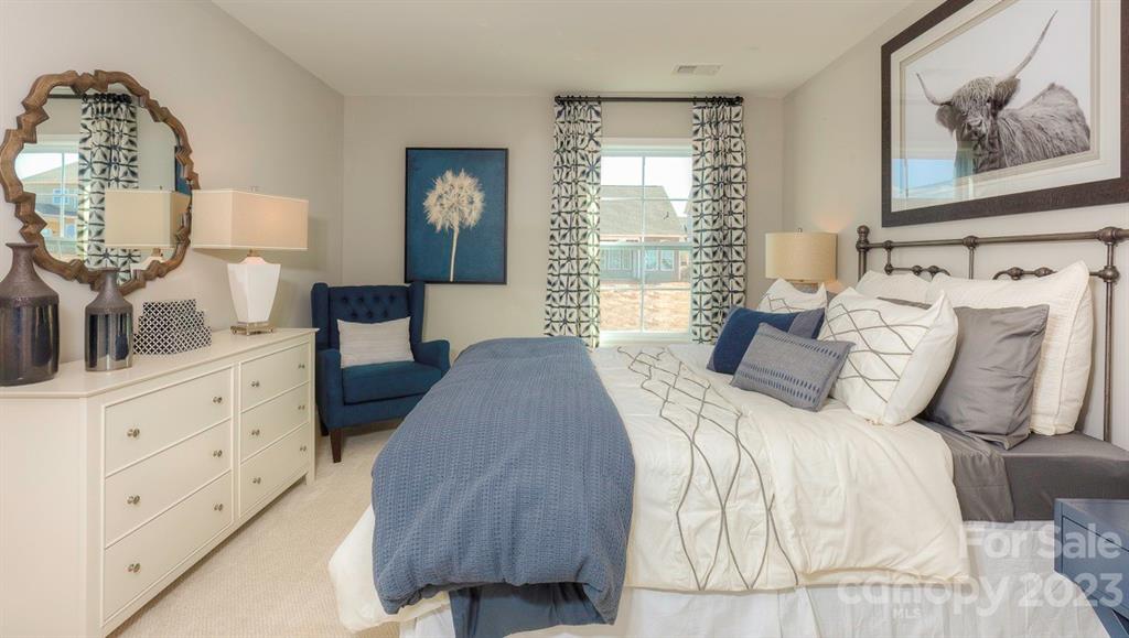 679 Fox Cove Road Hendersonville, NC 28792 - Photo 35 of 35 a bedroom with bed and window